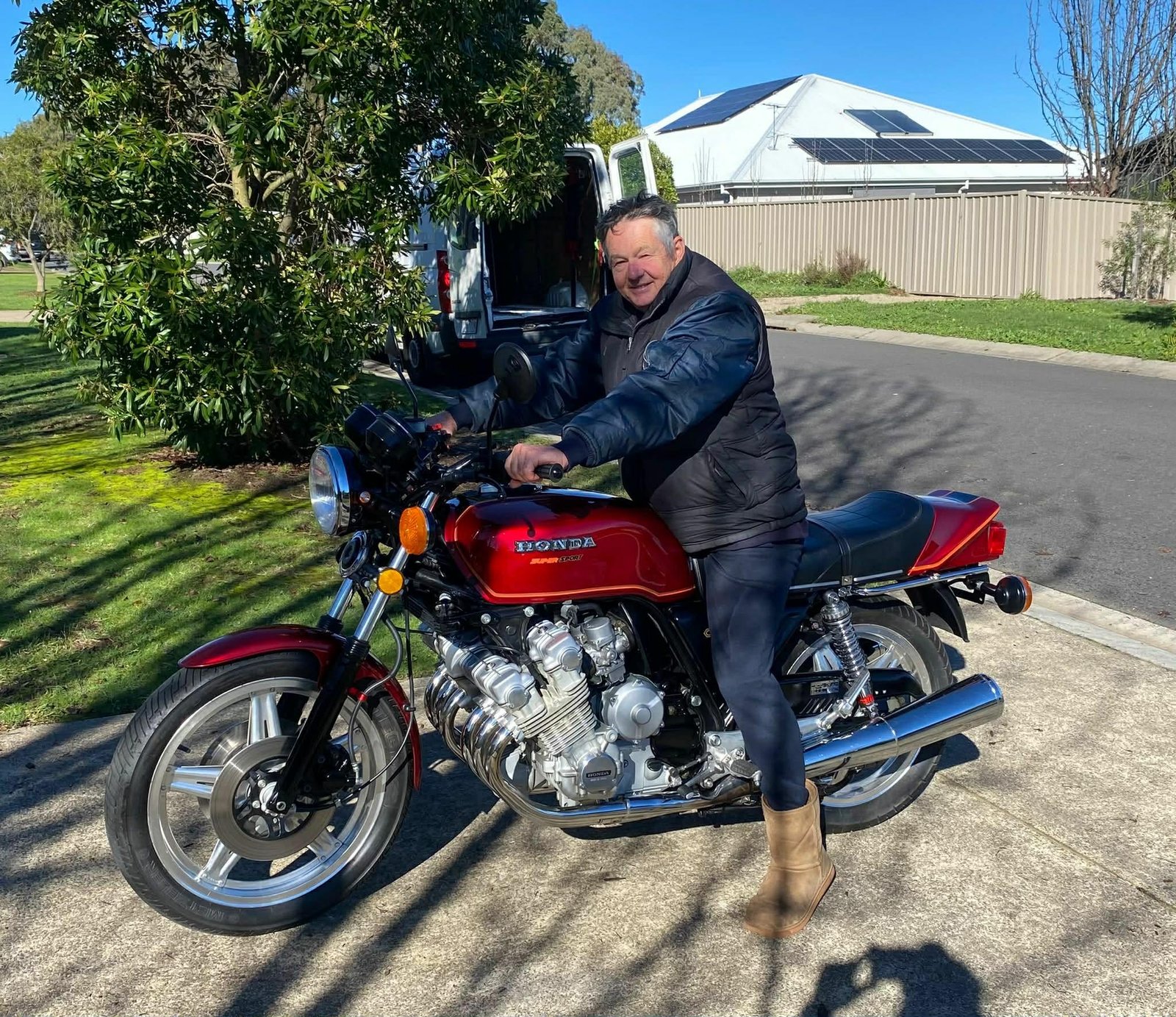 Customer with classic Honda motorcycle after interstate transport